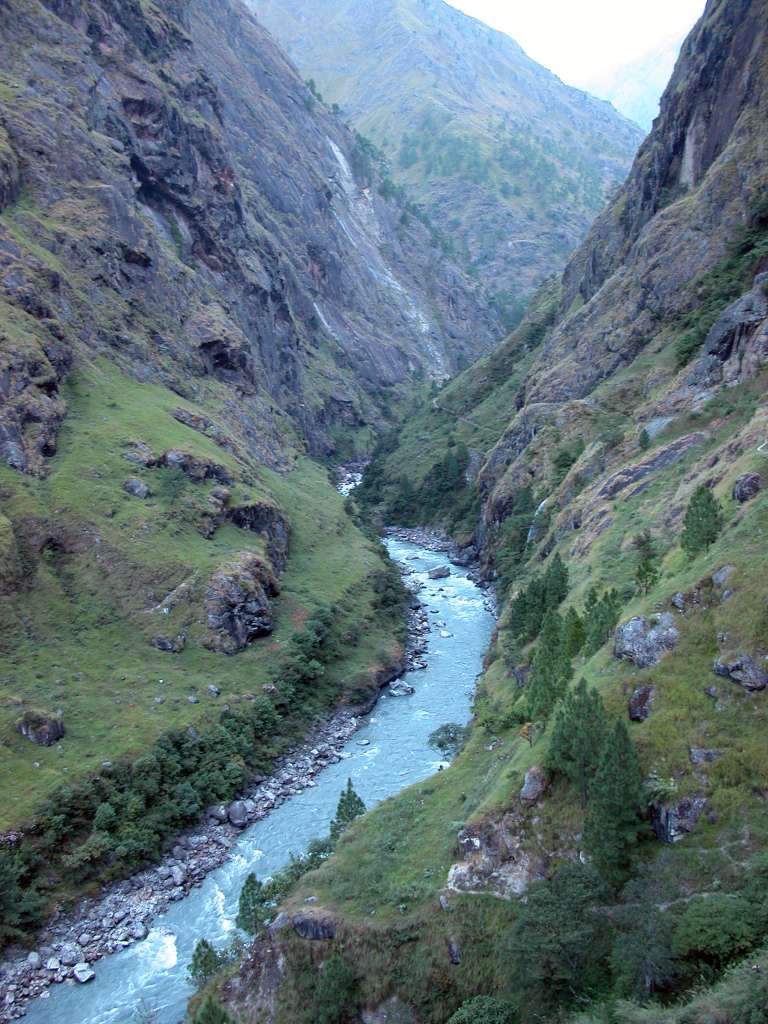 Manaslu 05 02 Valley Narrows After Ekle Bhatti Just after leaving Ekle Bhatti, the valley narrows, with the river carving a steep gorge below, while a waterfall is just visible on the right.